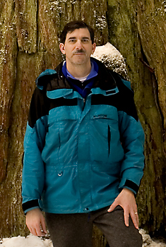 Kevin Merchant with old growth cedar.